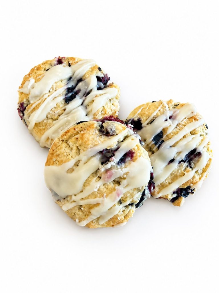 Blueberry cookies finished with a white chocolate drizzle