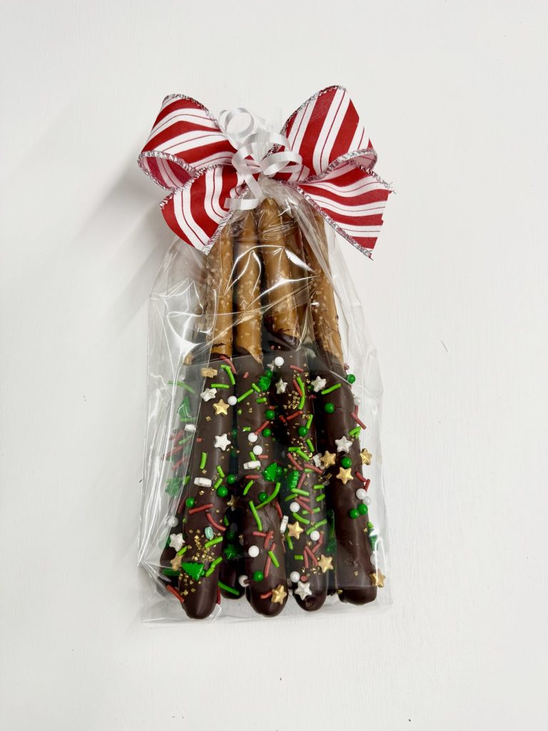 Chocolate-dipped pretzel rods with sprinkles, bagged and ribboned